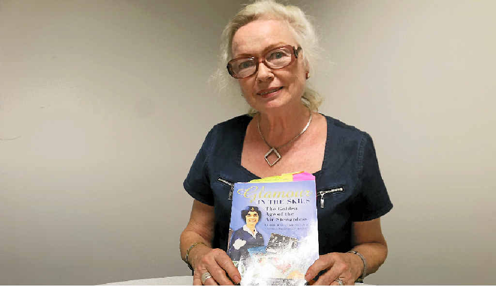 TALES FROM ABOVE: Author Libbie Escolme-Schmidt gave a speech on her book Glamour in the Skies, a feature on air hostesses, to the Gladstone Dimantina Book Club this week. Libbie (inset) during her early aviation years. TALES FROM ABOVE: Author Libbie Escolme-Schmidt gave a speech on her book Glamour in the Skies, a feature on air hostesses, to the Gladstone Dimantina Book Club this week. Libbie (inset) during her early aviation years.
